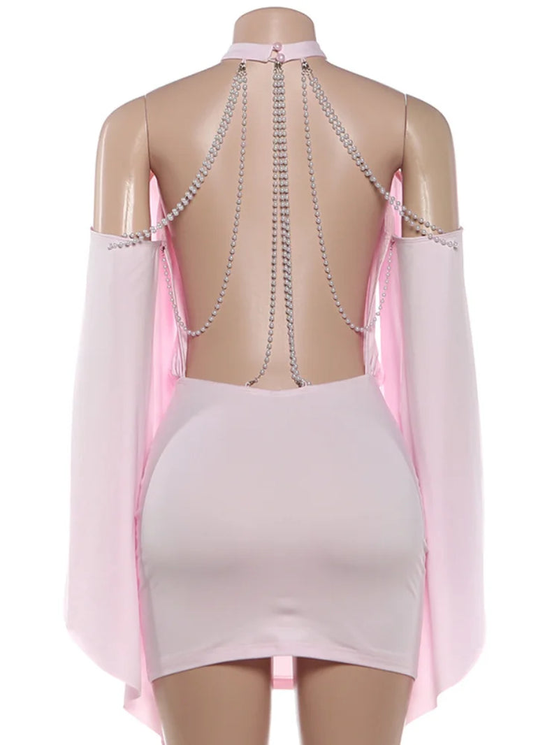 Step Into Spring with Our Stunning Backless Batwing Mini Dress - Perfect for Parties and Fashion-Forward Looks!